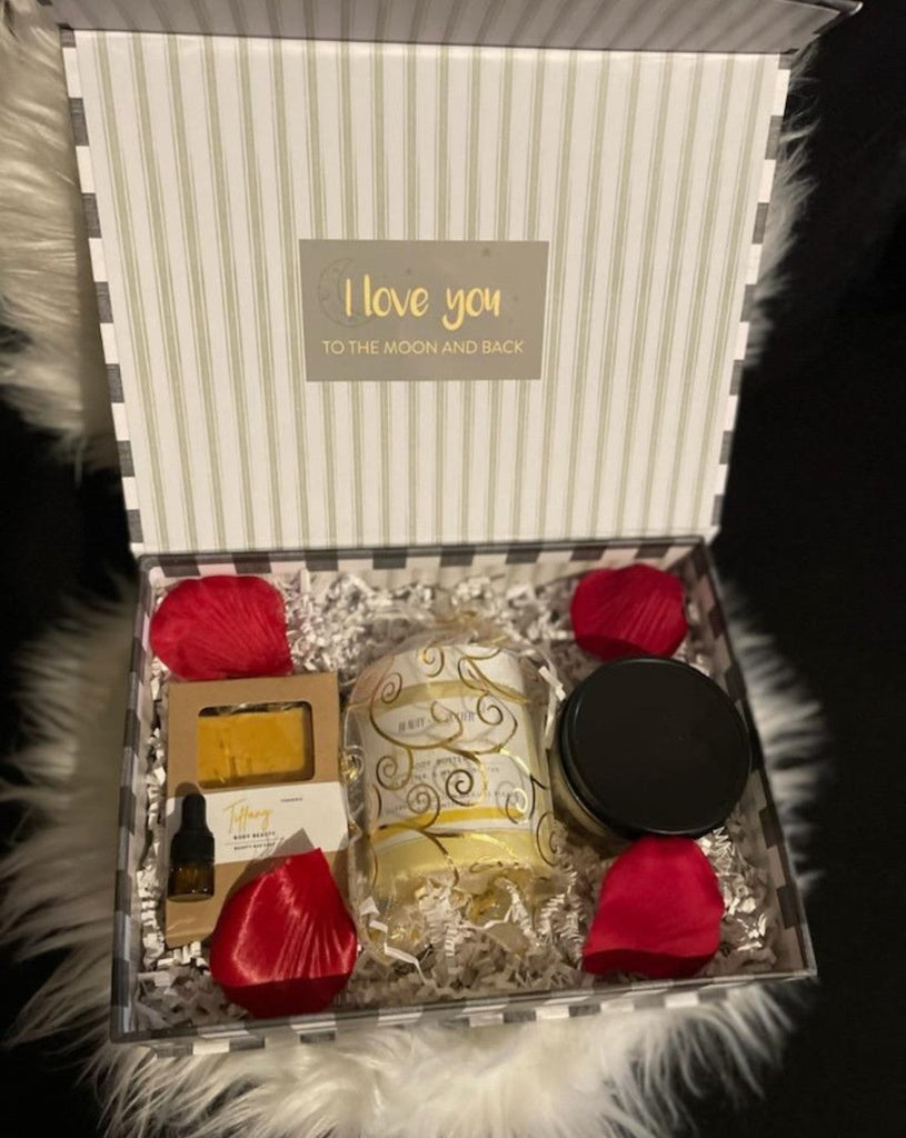Beauty in a Box Bundle featuring a candle, serum, and body butter, ideal for self-care and gifting.